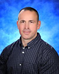 Dr. Christopher M. Wallis,