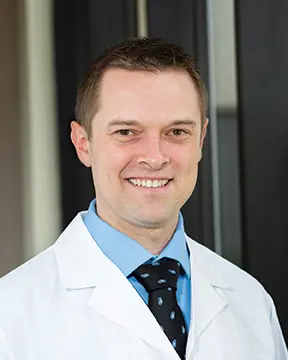 Dr. Adam B Greer