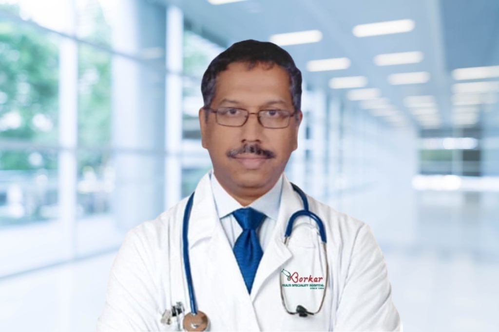 Dr. Rajesh         Kambli